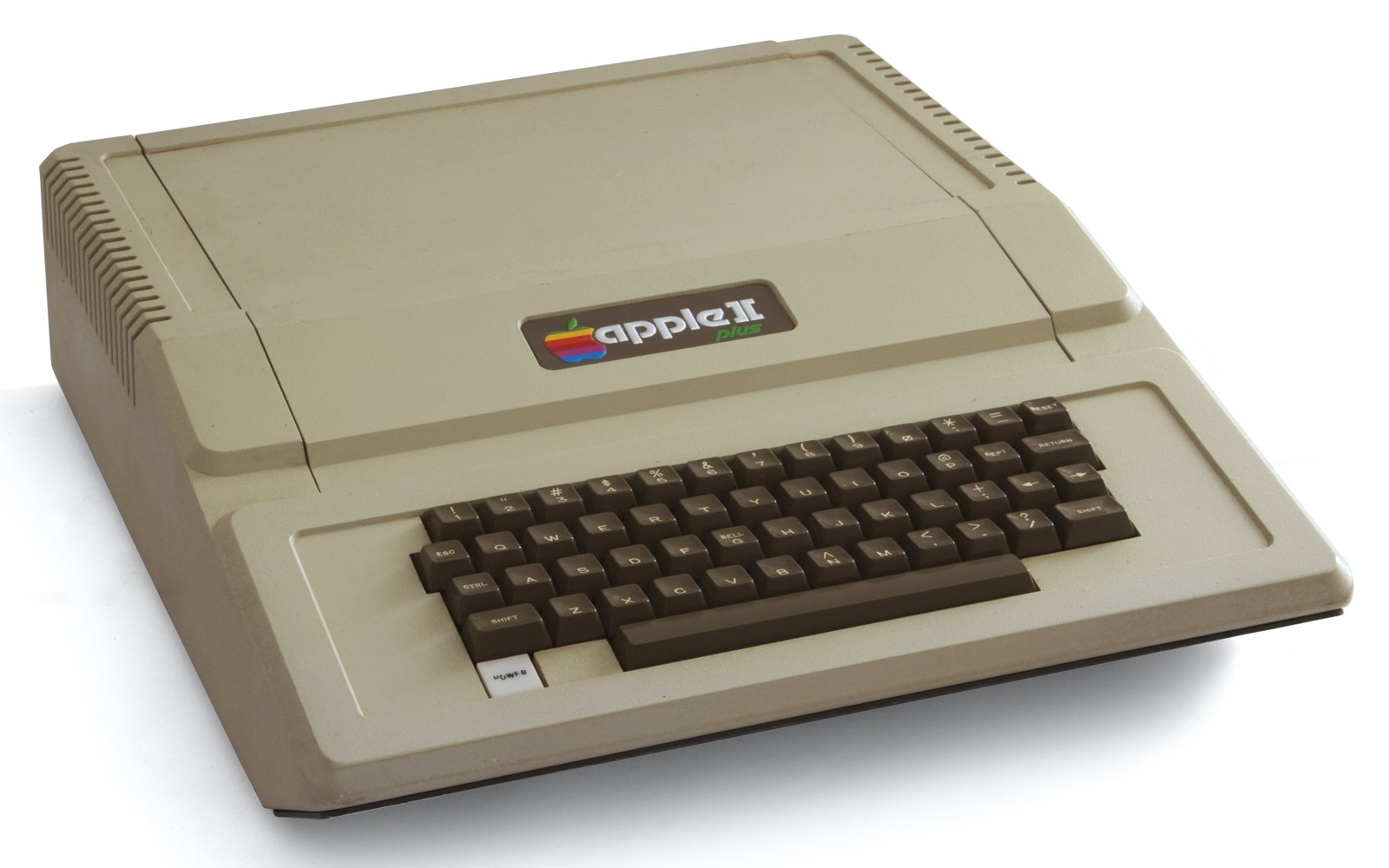 A beige Apple II Plus computer with a built-in dark brown keyboard and a rainbow Apple badge, seen at an angle on a white background.